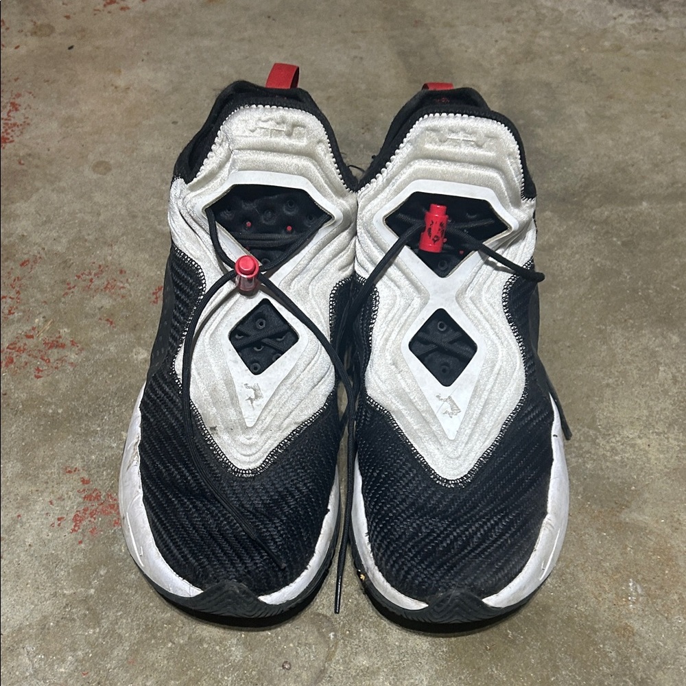 Nike Black and White Athletic Shoes with Red Accents